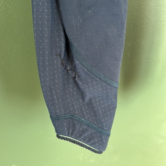 Lululemon Leggings. Size 2. Fixed hole in mesh panel (pictured). Navy Blue. - Picture 4 of 8